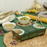 Condicrea: Pasta Pura Di Pistacchio Di Bronte DOP E Granella, inclinato a dx su tovaglietta paglia