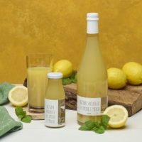 Nettare Bio Di Limone E Menta 200ml, frontale due fromati e limoni su tagliere